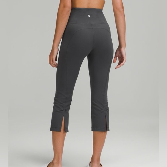 lululemon athletica Pants - Lululemon Black Cropped Leggings Slit Hem High Rise Size 2 NWOT